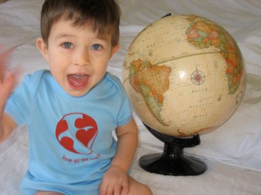 Our youngest tender sapling traveler, sporting his Love All the World shirt.